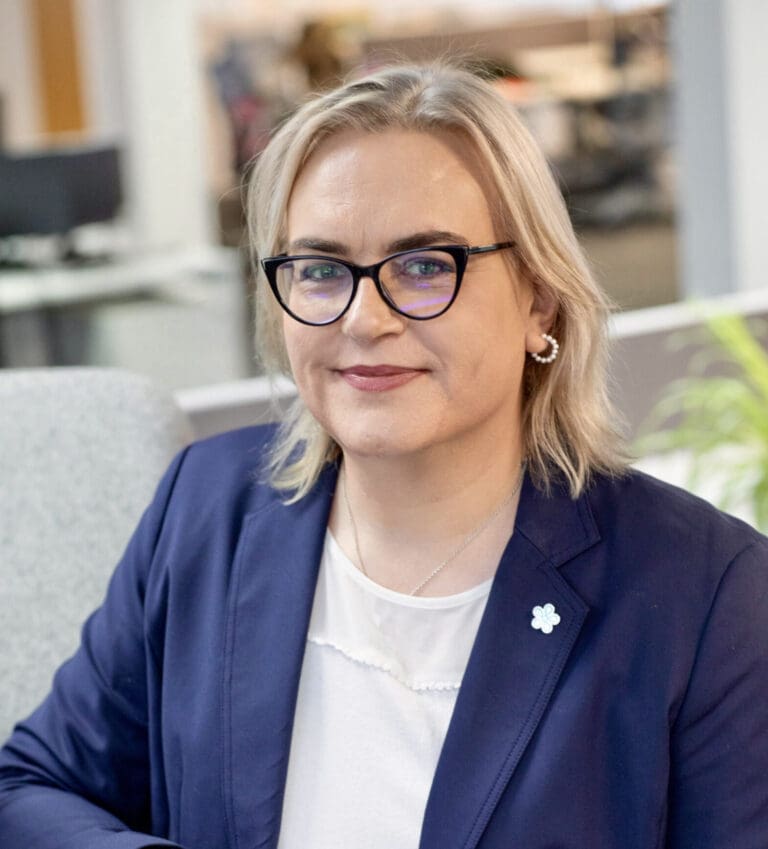 Lee Gilbert, Nourish CMO, smiles at the camera