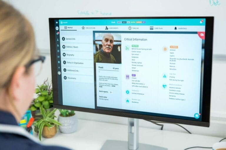 A carer looks at Nourish on a desktop screen
