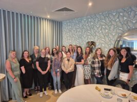 give to gain IWD group photo